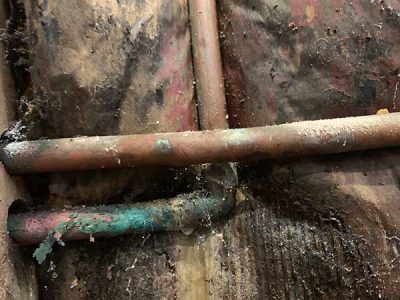 Leaking Pipe Water Damage Clean Up
